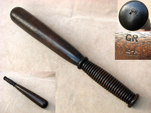 Long hardwood truncheon with grooved grip stamped 'GR'